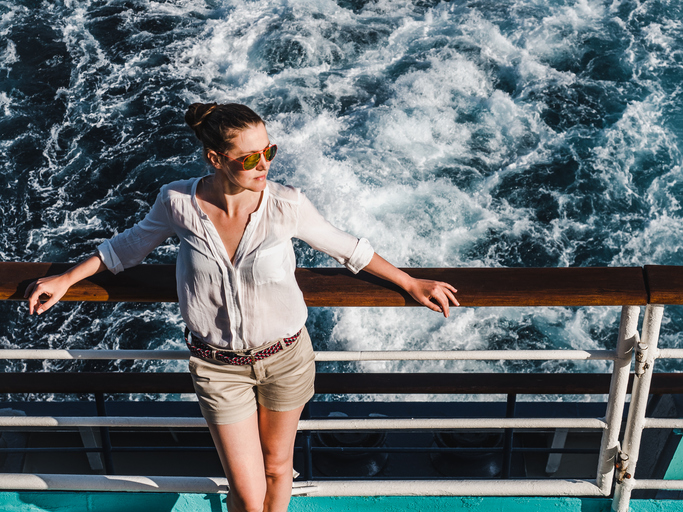 Pretty, cute woman on the empty deck